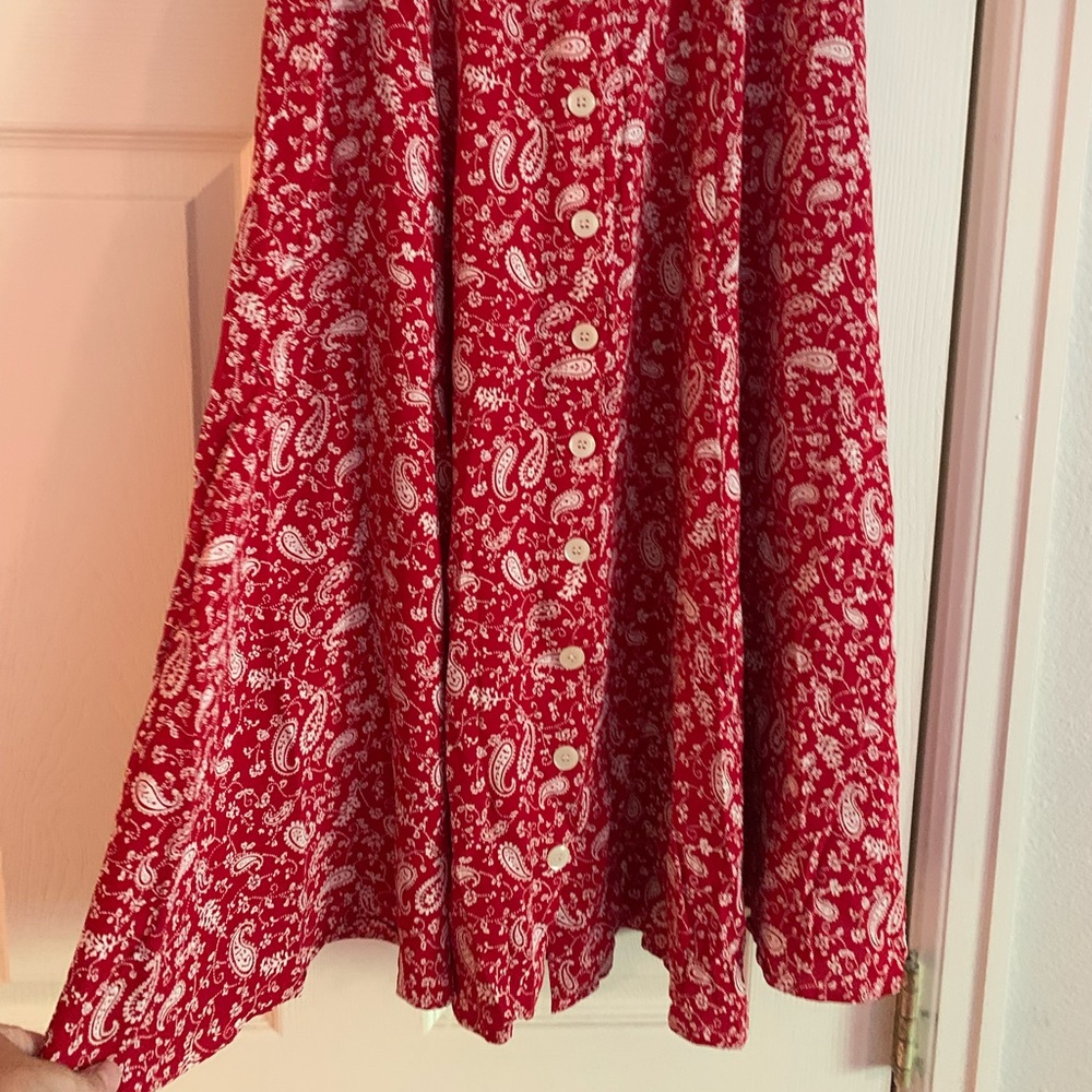 Mid length button up front red long skirt size 4